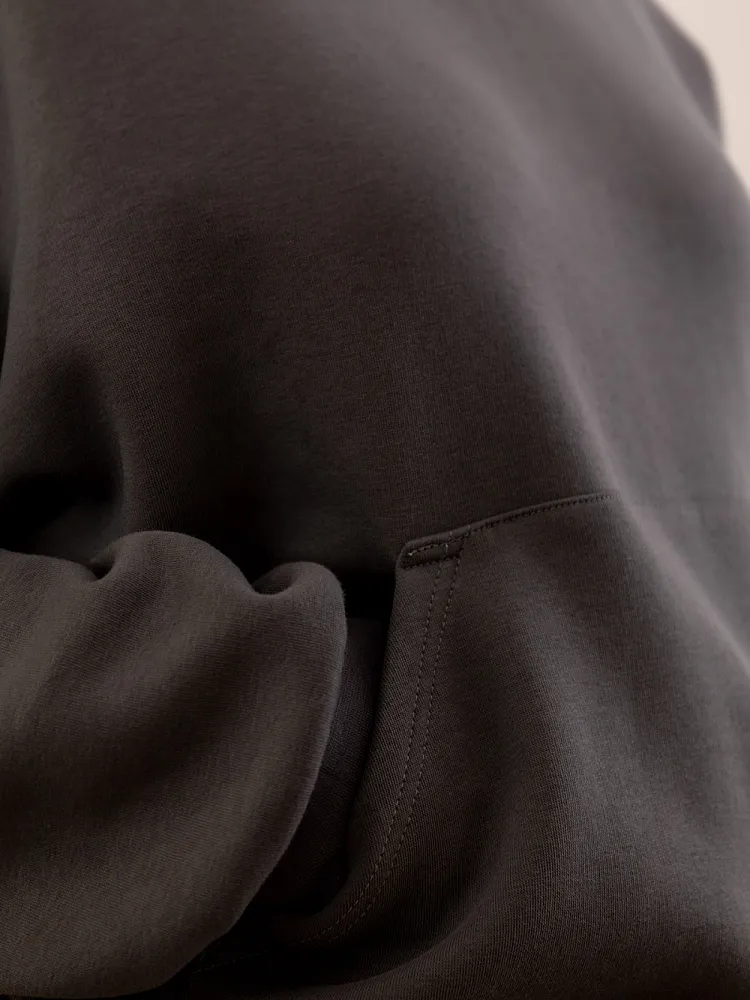 Oversized Hoodie mit Kapuze und Kängurutasche